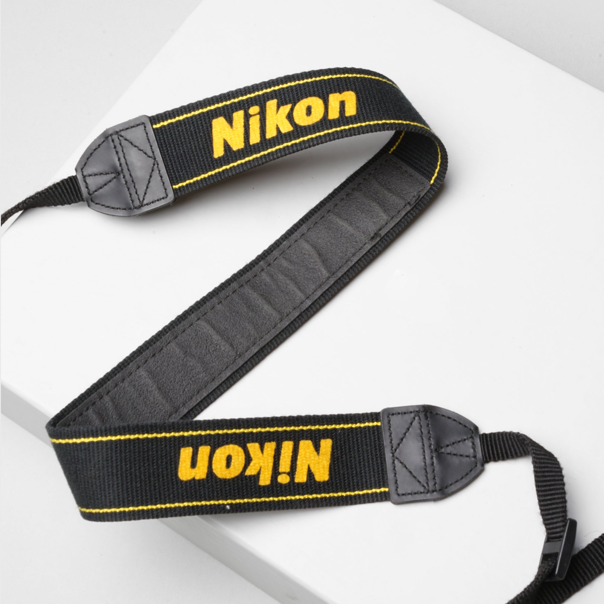 Buy Nikon original strap black now at Analogue Amsterdam